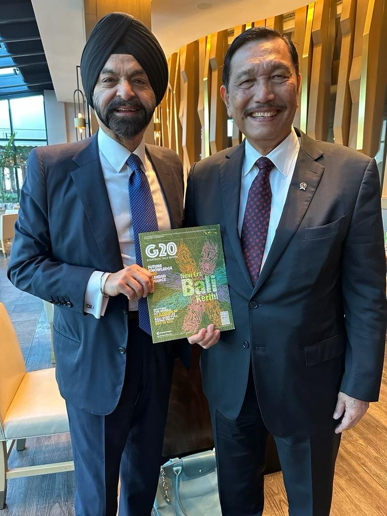 Ajay Banga and Luhut Binsar Pandjaitan holding the Group of Nations G20 Bali edition