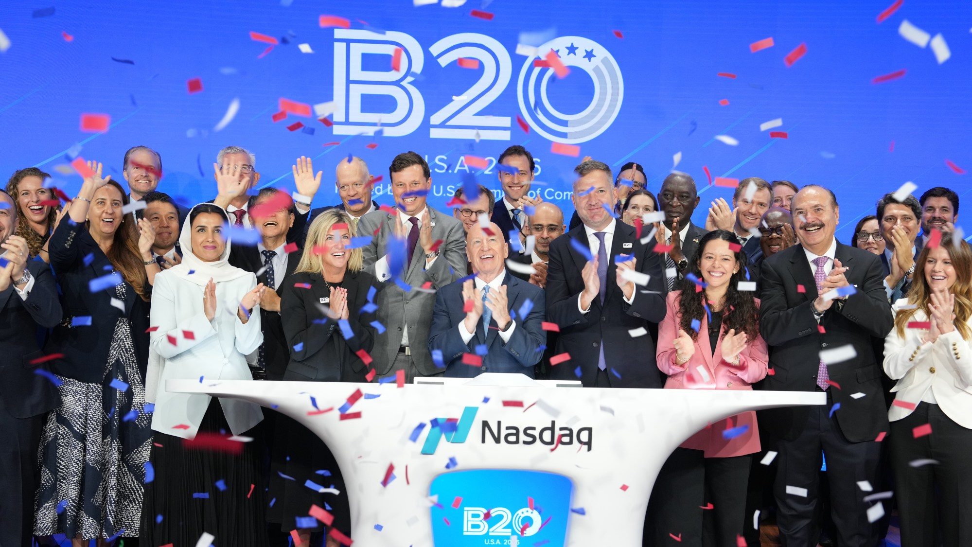 B20 USA leaders, international delegates and partners celebrate under confetti after ringing the Nasdaq opening bell in New York