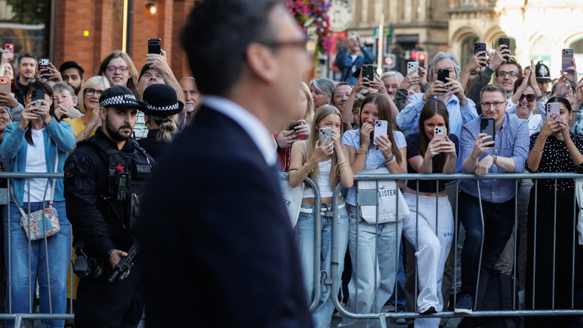 Prime Minister Andy Burnham greets crowds in Manchester