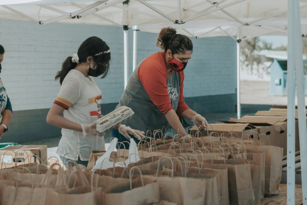 Volunteers packing food bags