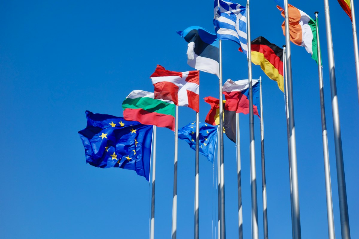 National flags flying outside an international venue