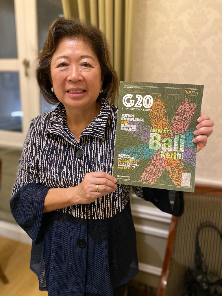 Mari Elka Pangestu, World Bank Group, holding the Group of Nations G20 Bali publication
